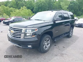 2017 Chevrolet Tahoe LT z VIN 1GNSKBKC8HR311969, wystawiony jako IAAI lot #42126414 z przebiegiem 160 994 mil mil oraz . Historia ofert i sprzedaży dostępna na DreamBid. Obrazek 19.
