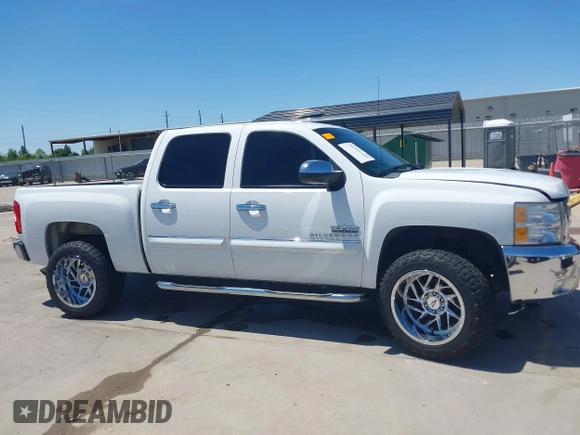 2013 Chevrolet Silverado 1500 LT with VIN 3GCPCSE05DG138211, listed as a IAAI auction lot 41966581 with 112,848 mi miles and . Bid and sale history available at DreamBid. Image 14.