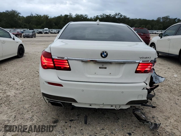 2013 BMW 7 Series 750i with VIN WBAYA8C54DC996569, listed as a Copart auction lot 74199774 with 107,871 mi miles and Salvage Title. Bid and sale history available at DreamBid. Image 6.