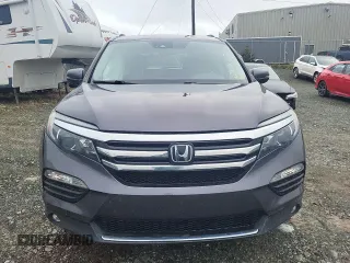 2018 Honda Pilot Touring z VIN 5FNYF6H93JB500695, wystawiony jako Copart lot #83302284 z przebiegiem 12 086 mil mil oraz Szkoda całkowita • Salvage title. Historia ofert i sprzedaży dostępna na DreamBid. Obrazek 5.