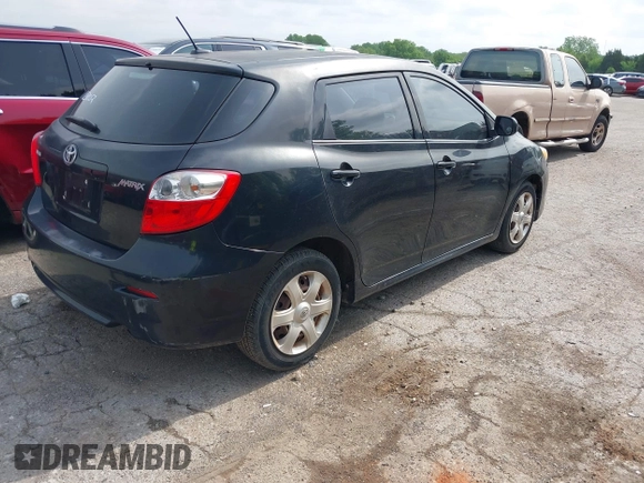 2009 Toyota Matrix with VIN 2T1KU40EX9C013986, listed as a IAAI auction lot 42117914 with 151,113 mi miles. Bid and sale history available at carsss.com. Image 4.
