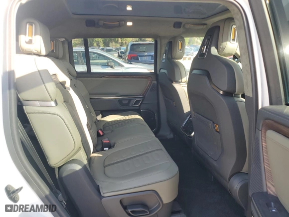 2023 Rivian R1S Adventure with VIN 7PDSGABA5PN027894, listed as a Copart auction lot 71442484 with 4,456 mi miles and Salvage Title. Bid and sale history available at carsss.com. Image 11.