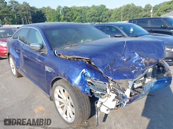 2015 Ford Taurus Limited with VIN 1FAHP2F86FG208798, listed as a IAAI auction lot 42679932 with 104,300 mi miles and . Bid and sale history available at DreamBid. Image 1.