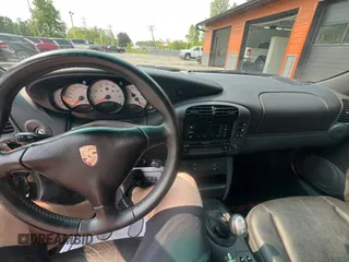 1999 Porsche 911 z VIN WP0CA2990XS651134, wystawiony jako Copart lot #59694365 z przebiegiem 80 805 mil mil oraz Czysty tytuł • Clean title. Historia ofert i sprzedaży dostępna na DreamBid. Obrazek 9.