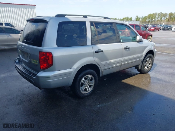 2003 Honda Pilot EX with VIN 2HKYF18613H539217, listed as a IAAI auction lot 41696214 with 329,118 mi miles. Bid and sale history available at carsss.com. Image 4.