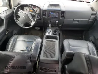 2012 Nissan Titan SV with VIN 1N6BA0EK4CN319941, listed as a Copart auction lot 43640705 with 210,885 mi miles and Salvage Title. Bid and sale history available at DreamBid. Image 8.