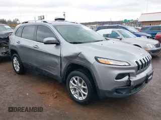 2016 Jeep Cherokee Latitude z VIN 1C4PJLCB2GW351333, wystawiony jako IAAI lot #41554118 z przebiegiem 97 019 mil mil oraz . Historia ofert i sprzedaży dostępna na DreamBid. Obrazek 1.