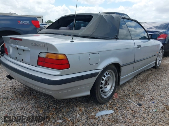 1998 BMW 3 Series 323icA with VIN WBABJ8334WEM22565, listed as a IAAI auction lot 41927799 with 165,077 mi miles. Bid and sale history available at carsss.com. Image 4.