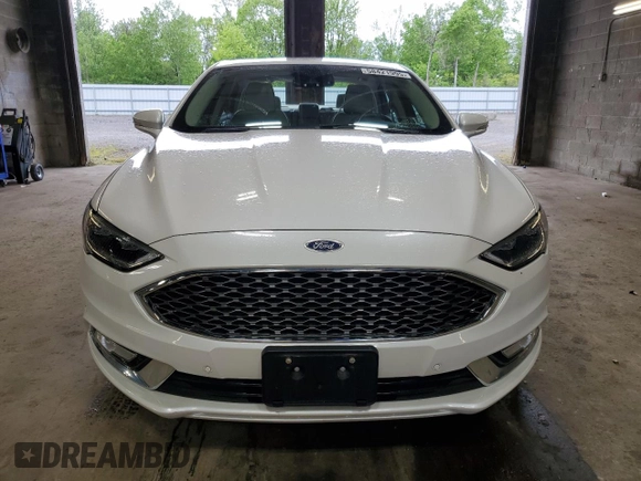 2017 Ford Fusion Titanium with VIN 3FA6P0D99HR138992, listed as a Copart auction lot 58421995 with 24,057 mi miles and Salvage title. Bid and sale history available at DreamBid. Image 5.