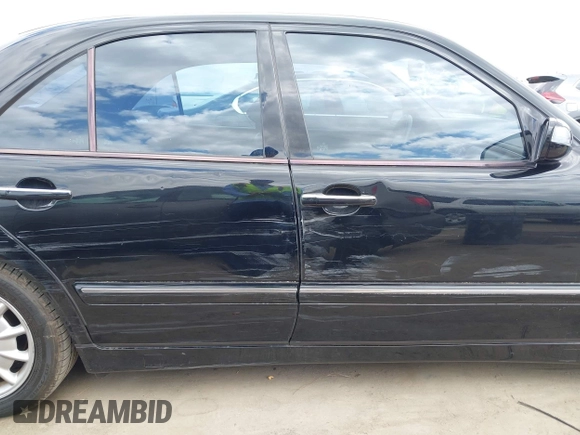 2001 Mercedes-Benz E 320 with VIN WDBJF65J91B363439, listed as a IAAI auction lot 42058536 with 61,272 mi miles and . Bid and sale history available at DreamBid. Image 18.