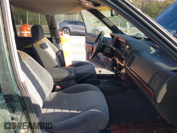1996 Jeep Grand Cherokee with VIN 1J4EZ58Y7TC128428, listed as a IAAI auction lot 42050443 with 241,591 mi miles and . Bid and sale history available at DreamBid. Image 5.