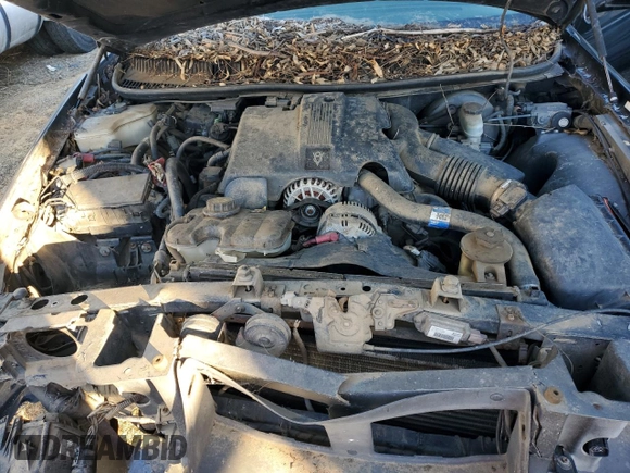 2003 Lincoln Town Car Executive z VIN 1L1FM81W23Y609867, wystawiony jako Copart lot #89137665 z przebiegiem 175 211 mil mil oraz Szkoda całkowita • Salvage title. Historia ofert i sprzedaży dostępna na DreamBid. Obrazek 11.