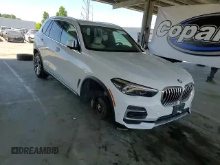 2022 BMW X5 xDrive40i z VIN 5UXCR6C0XN9L83285, wystawiony jako Copart lot #56176995 z przebiegiem 30 779 mil mil oraz Szkoda całkowita • Salvage title. Historia ofert i sprzedaży dostępna na DreamBid. Obrazek 14.