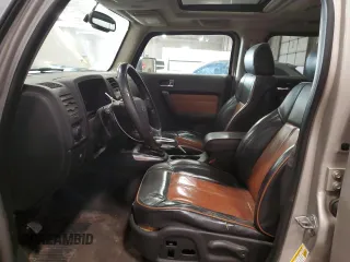 2007 Hummer H3 SUV with VIN 5GTDN13E778137599, listed as a Copart auction lot 76863904 with 210,810 mi miles and Salvage Title. Bid and sale history available at DreamBid. Image 7.