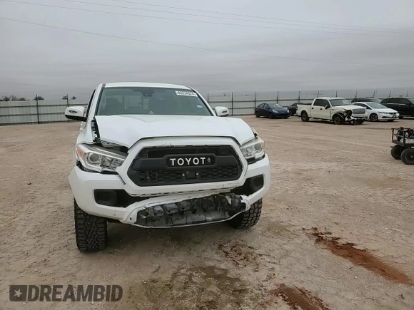2018 Toyota Tacoma SR with VIN 3TMCZ5AN4JM143350, listed as a Copart auction lot 83234524 with 70,853 mi miles and Clean Title. Bid and sale history available at DreamBid. Image 11.