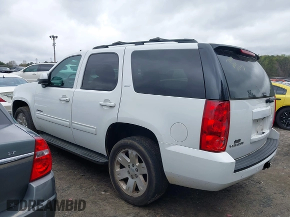 2013 GMC Yukon SLT with VIN 1GKS1CE00DR225296, listed as a IAAI auction lot 41854049 with 241,437 mi miles. Bid and sale history available at carsss.com. Image 14.