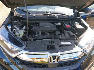 2019 Honda CR-V EX with VIN 2HKRW2H5XKH674504, listed as a IAAI auction lot 41823838 with 104,281 mi miles. Bid and sale history available at carsss.com. Image 9.