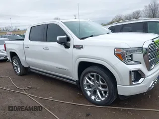 2020 GMC Sierra 1500 Denali with VIN 3GTU9FEL8LG295605, listed as a IAAI auction lot 41922060 with 65,561 mi miles and . Bid and sale history available at DreamBid. Image 13.