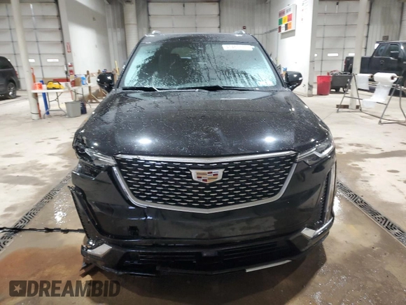 2021 Cadillac XT6 Premium Luxury with VIN 1GYKPDRS0MZ204101, listed as a Copart auction lot 45460135 with 20,104 mi miles and Salvage title. Bid and sale history available at DreamBid. Image 5.