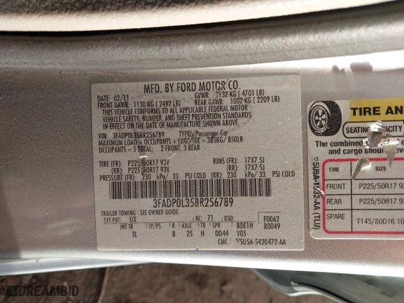2011 Ford Fusion Hybrid with VIN 3FADP0L35BR256789, listed as a IAAI auction lot 40737584 with 133,683 mi miles. Bid and sale history available at carsss.com. Image 9.