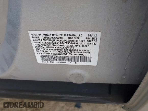 2012 Honda Pilot EX-L with VIN 5FNYF4H5XCB051133, listed as a IAAI auction lot 41907624 with 202,244 mi miles and . Bid and sale history available at carsss.com. Image 9.