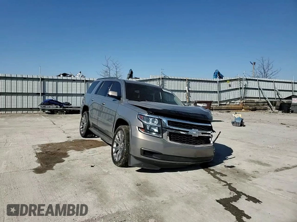 2018 Chevrolet Tahoe LS with VIN 1GNSCAKC5JR263554, listed as a Copart auction lot 48632805 with 87,445 mi miles and Salvage title. Bid and sale history available at DreamBid. Image 12.