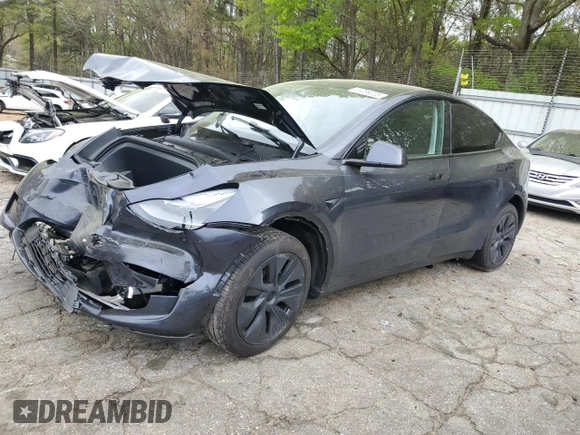 2024 Tesla Model Y Long Range z VIN 7SAYGDEE9RA293776, wystawiony jako Copart lot #51289225 z przebiegiem 12 990 mil mil oraz Szkoda całkowita • Salvage title. Historia ofert i sprzedaży dostępna na DreamBid. Obrazek 1.