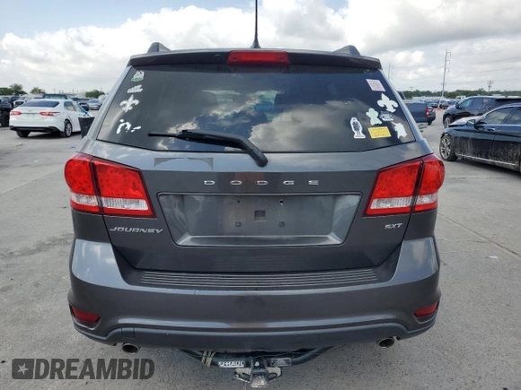 2014 Dodge Journey SXT with VIN 3C4PDCBG8ET140984, listed as a Copart auction lot 54408445 with 135,290 mi miles and Salvage Title. Bid and sale history available at DreamBid. Image 6.