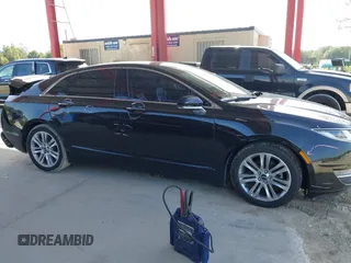 2014 Lincoln MKZ Hybrid z VIN 3LN6L2LU5ER831041, wystawiony jako IAAI lot #42447895 z przebiegiem 92 102 mil mil oraz . Historia ofert i sprzedaży dostępna na DreamBid. Obrazek 13.
