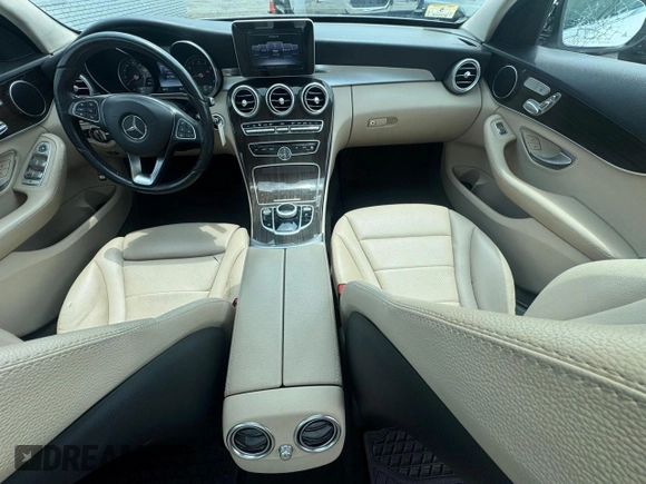 2017 Mercedes-Benz C 300 with VIN 55SWF4KB2HU211825, listed as a Copart auction lot 65092705 with 107,705 mi miles and Clean title. Bid and sale history available at DreamBid. Image 9.