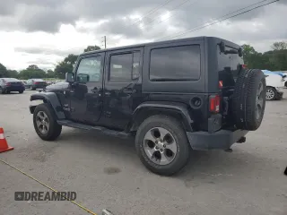 2017 Jeep Wrangler Unlimited Sahara with VIN 1C4BJWEG9HL633296, listed as a Copart auction lot 61387685 with 74,035 mi miles and Salvage title. Bid and sale history available at DreamBid. Image 2.