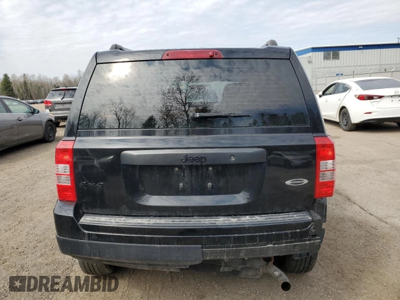 2015 Jeep Patriot High Altitude with VIN 1C4NJRAB0FD392874, listed as a Copart auction lot 52767375 with 134,522 mi miles and Salvage Title. Bid and sale history available at DreamBid. Image 6.