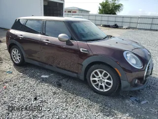 2017 MINI Clubman Cooper with VIN WMWLN5C51H2E32907, listed as a Copart auction lot 51226515 with 124,907 mi miles and Salvage Title. Bid and sale history available at DreamBid. Image 4.