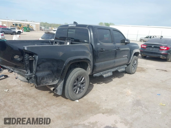 2023 Toyota Tacoma 4WD SR with VIN 3TYCZ5AN4PT170688, listed as a IAAI auction lot 41998053 with 20,770 mi miles. Bid and sale history available at carsss.com. Image 4.