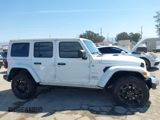 2024 Jeep Wrangler Sahara with VIN 1C4RJXP61RW126904, listed as a IAAI auction lot 41998215 with 32,034 mi miles and . Bid and sale history available at DreamBid. Image 13.
