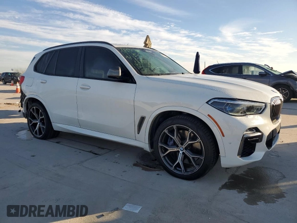 2020 BMW X5 M50i with VIN 5UXJU4C01LLE45993, listed as a Copart auction lot 88904235 with 64,841 mi miles and Salvage Title. Bid and sale history available at DreamBid. Image 4.