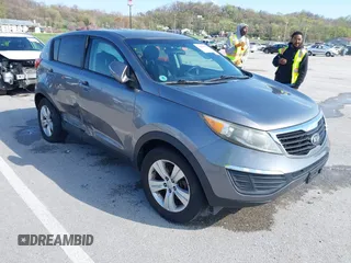 2013 Kia Sportage LX with VIN KNDPB3A24D7365157, listed as a IAAI auction lot 41968652 with 137,055 mi miles and . Bid and sale history available at carsss.com. Image 1.