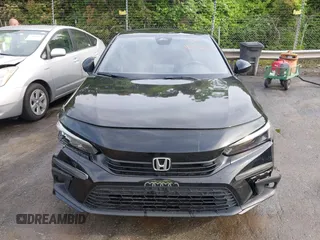 2022 Honda Civic Sport z VIN 2HGFE2F50NH604212, wystawiony jako IAAI lot #42042596 z przebiegiem 40 634 mil mil oraz . Historia ofert i sprzedaży dostępna na DreamBid. Obrazek 12.