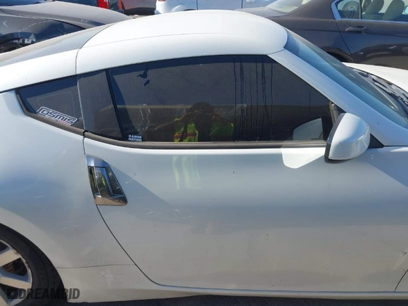 2018 Nissan 370Z Coupe Sport Tech with VIN JN1AZ4EH8JM571040, listed as a IAAI auction lot 42004760 with 115,923 mi miles. Bid and sale history available at carsss.com. Image 13.