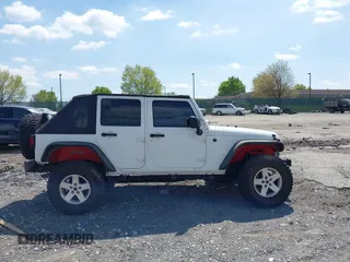 2012 Jeep Wrangler Unlimited Sport z VIN 1C4HJWDG0CL222194, wystawiony jako IAAI lot #42076024 z przebiegiem Nie podano mil oraz . Historia ofert i sprzedaży dostępna na DreamBid. Obrazek 14.