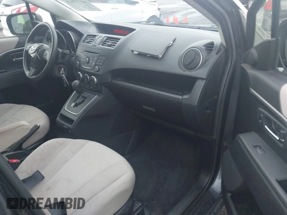 2015 Mazda 5 Sport with VIN JM1CW2BL3F0188052, listed as a IAAI auction lot 40777036 with 69,405 mi miles. Bid and sale history available at carsss.com. Image 5.