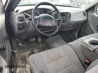 2002 Ford F-150 XL with VIN 1FTRF172X2NB77521, listed as a Copart auction lot 43993885 with 339,289 mi miles and Salvage Title. Bid and sale history available at carsss.com. Image 8.