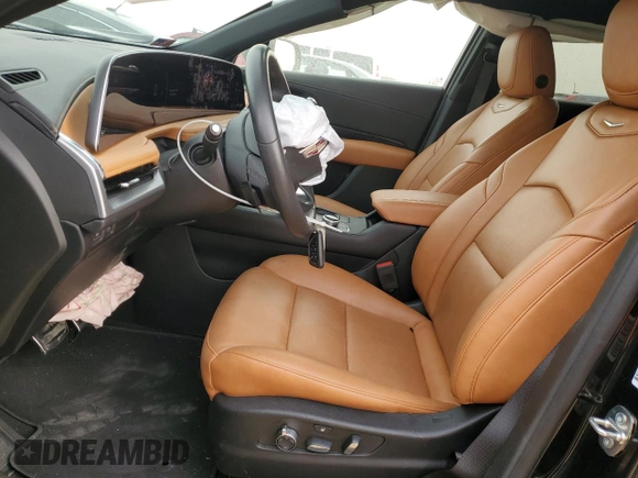 2024 Cadillac XT4 FWD Sport with VIN 1GYFZER46RF100076, listed as a Copart auction lot 45741285 with 11,616 mi miles and Salvage title. Bid and sale history available at DreamBid. Image 7.