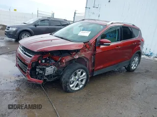 2014 Ford Escape Titanium with VIN 1FMCU9J92EUE01077, listed as a IAAI auction lot 41642337 with 26,002 mi miles. Bid and sale history available at carsss.com. Image 2.