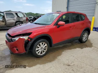 2015 Mazda CX-5 Sport z VIN JM3KE2BE6F0456079, wystawiony jako Copart lot #59800825 z przebiegiem 138 939 mil mil oraz Czysty tytuł • Clean title. Historia ofert i sprzedaży dostępna na DreamBid. Obrazek 1.