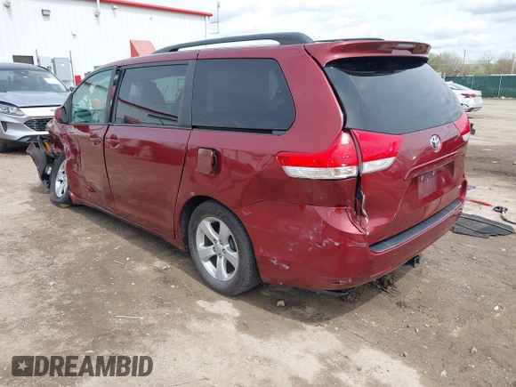 2014 Toyota Sienna LE AAS with VIN 5TDKK3DC4ES462090, listed as a IAAI auction lot 41942354 with 215,814 mi miles. Bid and sale history available at carsss.com. Image 3.