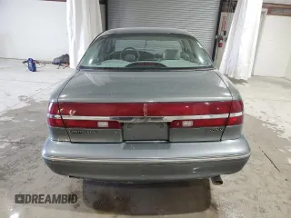 1997 Lincoln Continental with VIN 1LNLM97VXVY624609, listed as a Copart auction lot 73921634 with 119,746 mi miles and Salvage Title. Bid and sale history available at carsss.com. Image 6.