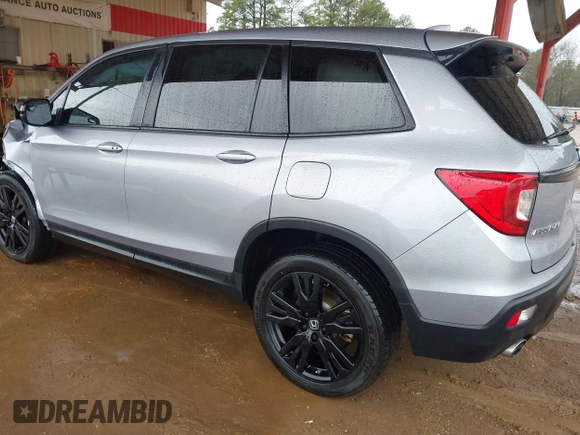 2021 Honda Passport Sport with VIN 5FNYF7H26MB014556, listed as a IAAI auction lot 41683680 with 97,829 mi miles and . Bid and sale history available at DreamBid. Image 3.