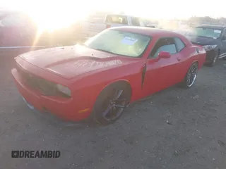 2011 Dodge Challenger z VIN 2B3CJ4DGXBH561850, wystawiony jako IAAI lot #41139802 z przebiegiem 155 948 mil mil oraz . Historia ofert i sprzedaży dostępna na DreamBid. Obrazek 18.