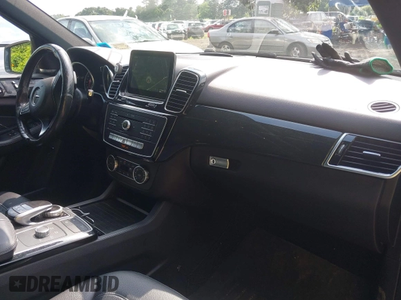 2017 Mercedes-Benz GLE 350 with VIN 4JGDA5HB6HA923747, listed as a IAAI auction lot 42740129 with 55,635 mi miles and . Bid and sale history available at DreamBid. Image 5.
